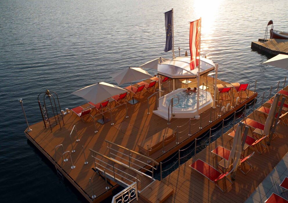 Wooden platform on Lake Wolfgang with jacuzzi and loungers
