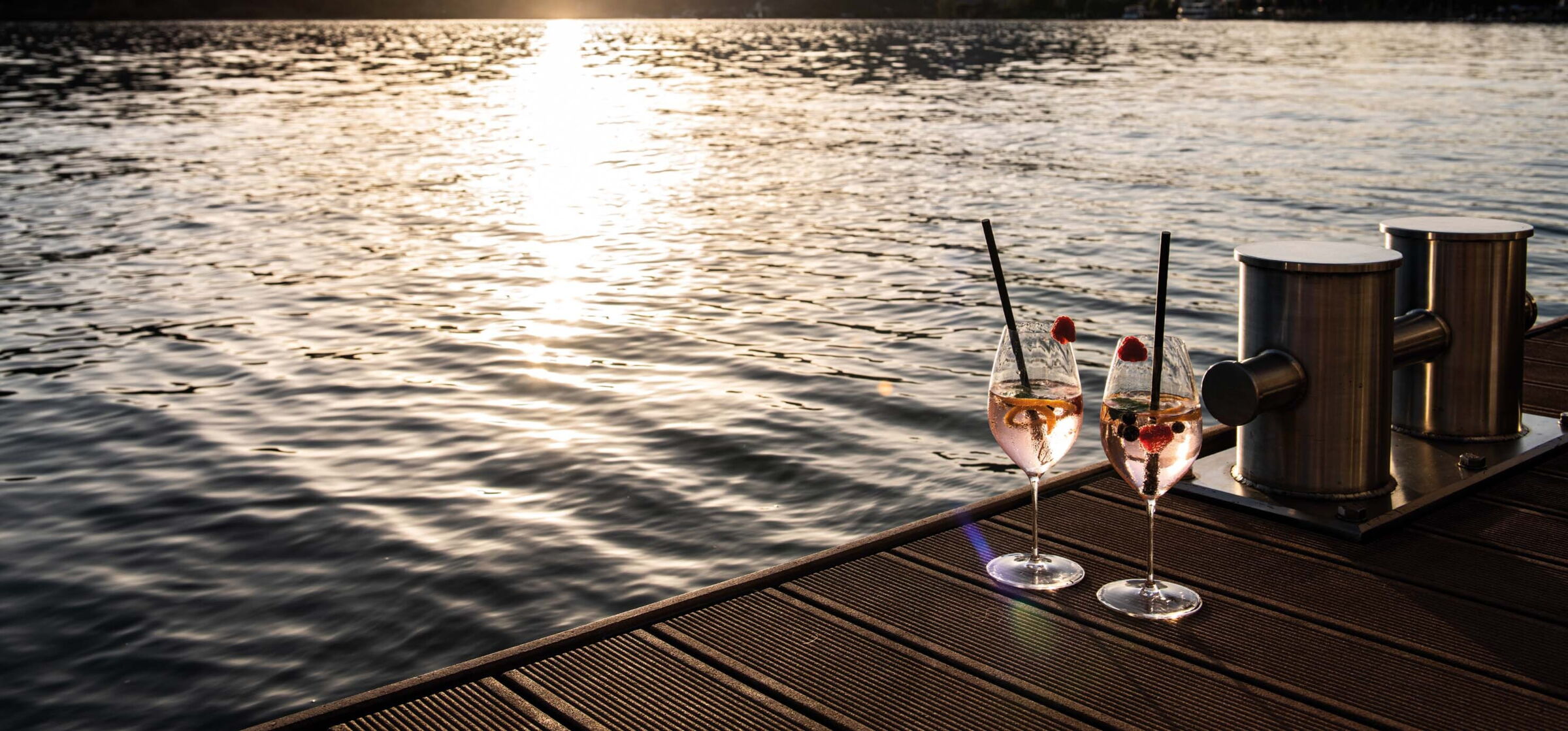 Two glasses of Lillet on the jetty on Lake Wolfgang