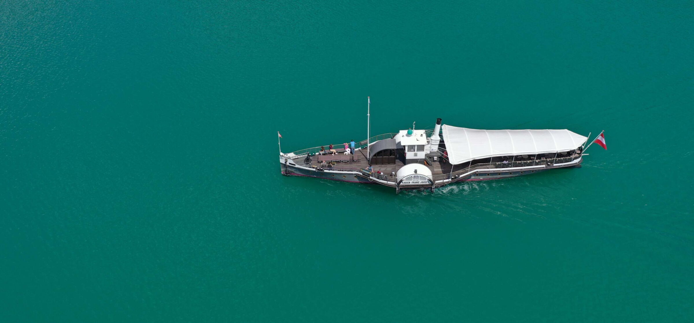 Upper view of a moving ship on Lake Wolfgang